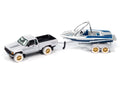 White Lightning Chase 1985 Toyota SR5 Pickup w/Malibu Speed Boat Blue Hulls & Haulers Johnny Lightning - Big J's Garage